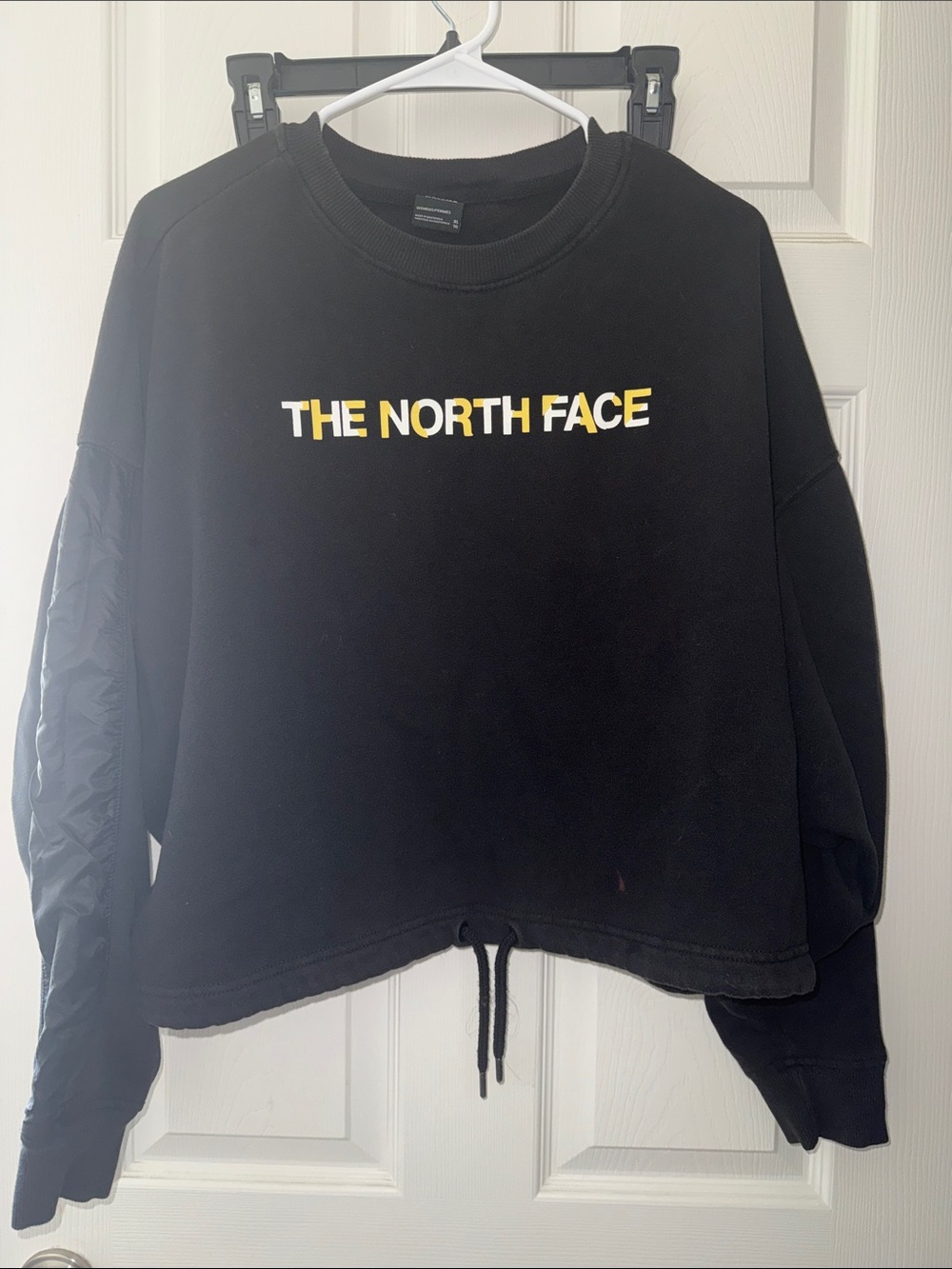 The North Face Black Sweatshirt with Yellow Logo Accent
